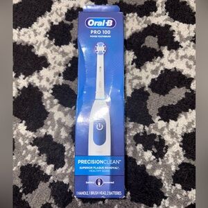 Oral B Pro 100 Electric Toothbrush.